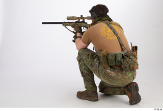 Photos Brandon Davis Pose  3 aiming gun kneeling shooting…